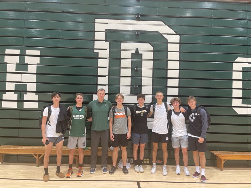 Tour athletes with a Dartmouth coach in the Dartmouth gym.