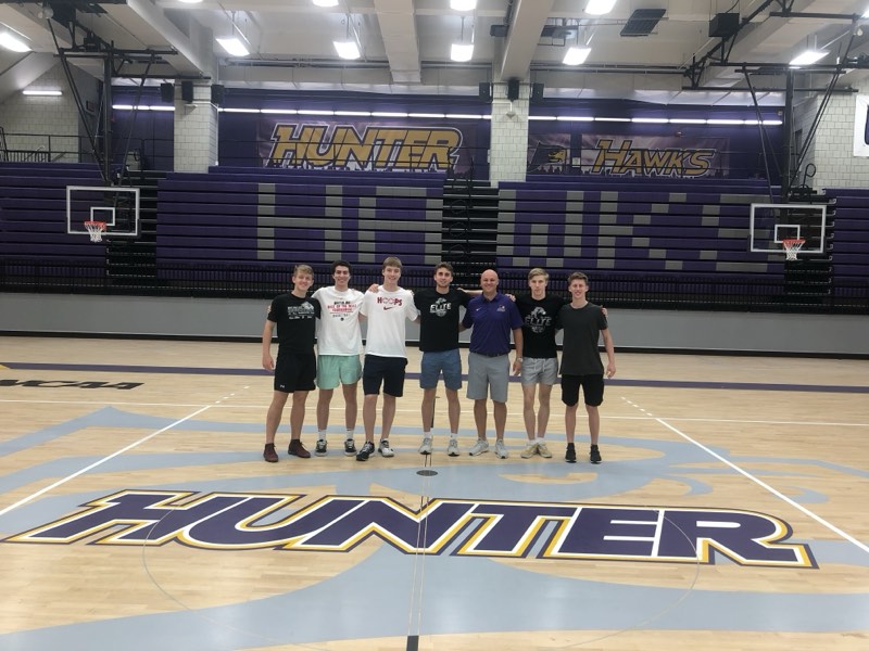 Tour athletes at centre court at Hunter College.
