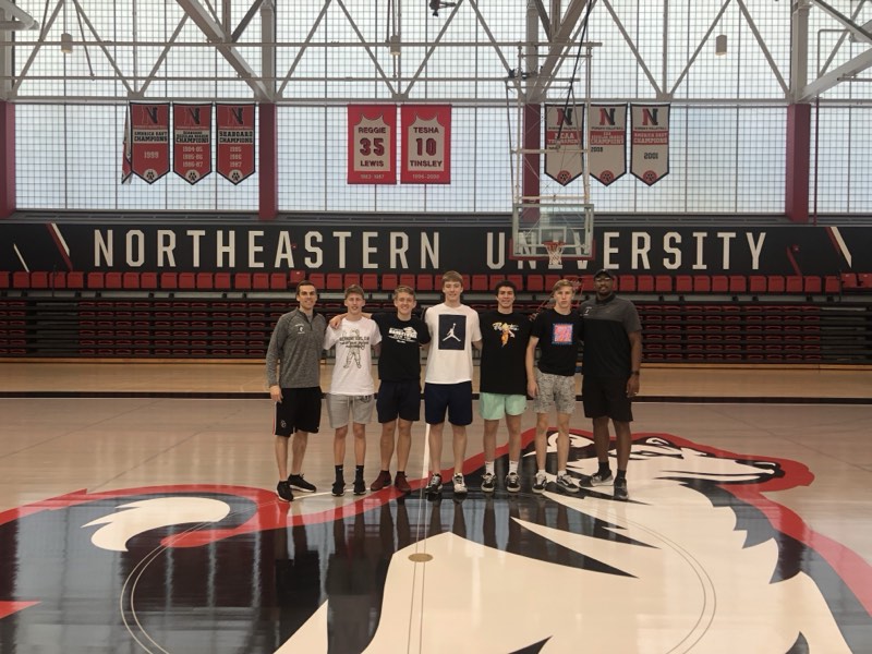 Tour athletes at centre court at Northeastern University.