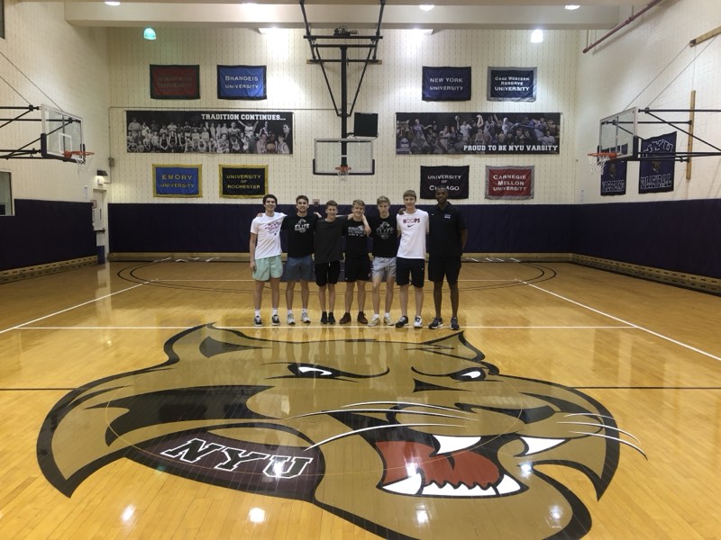 Tour athletes at centre court at New York University.